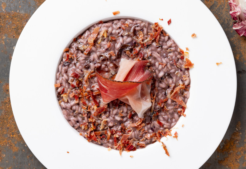 Risotto radicchio e speck – King’s Piatto di risotto al radicchio e speck - King's